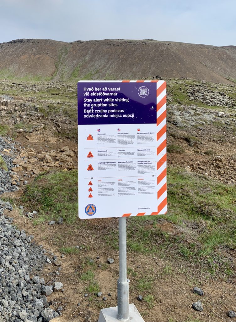 Safety sign along path hiking to the erupting volcano in Iceland