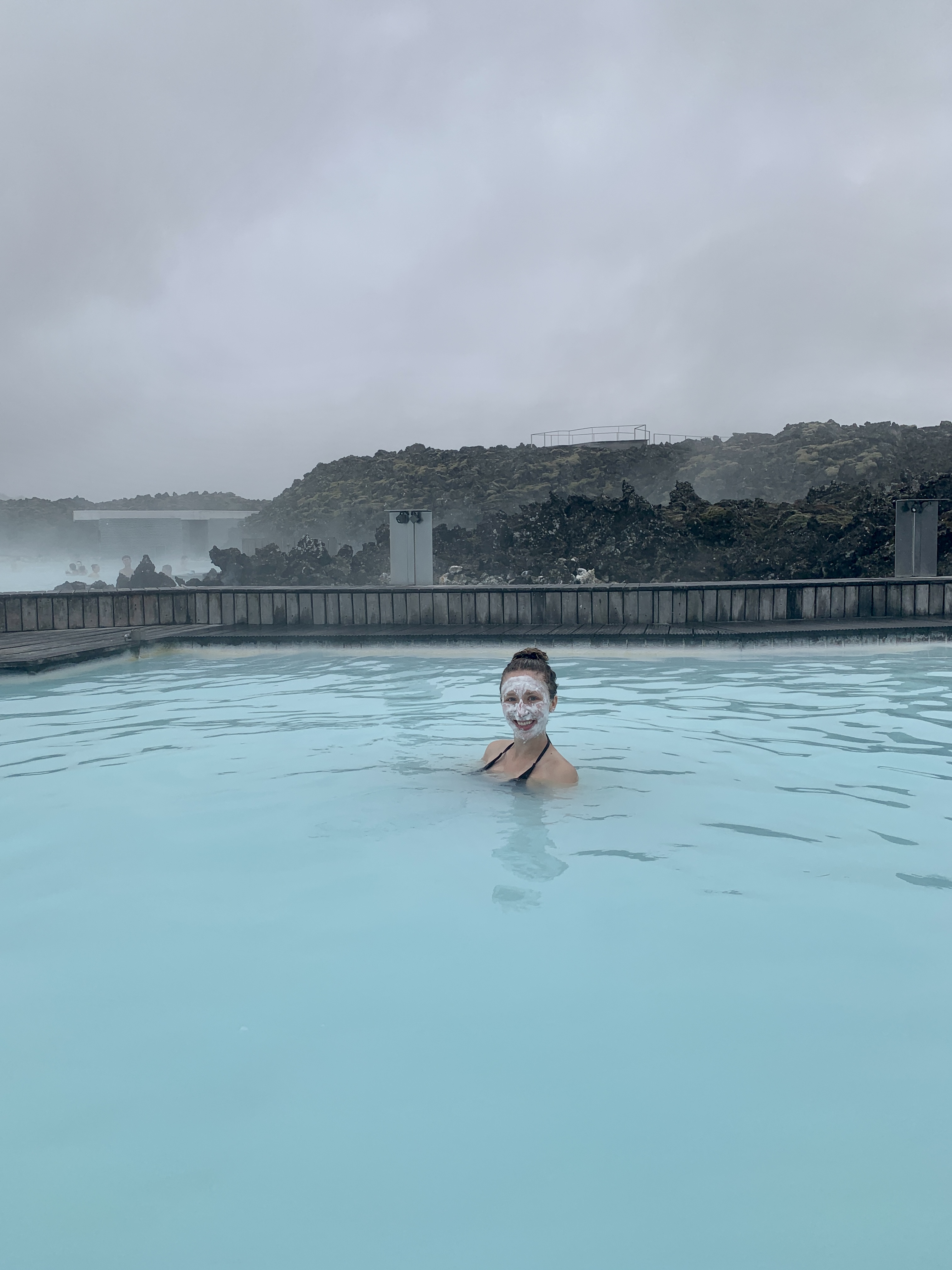 Amanda swimming in the Blue Lagoon with a Silica Face Mask on