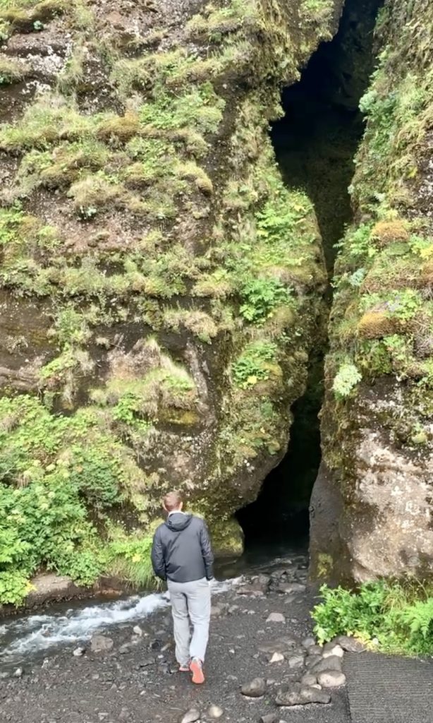 Mark walking to the crack in the canyon where Gljúfrabúi is located